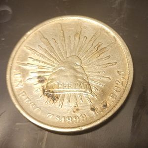 1899 silver Mexico Un peso coin